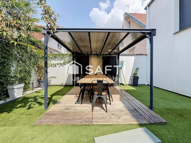 Magnifique duplex avec jardin — photo du bien