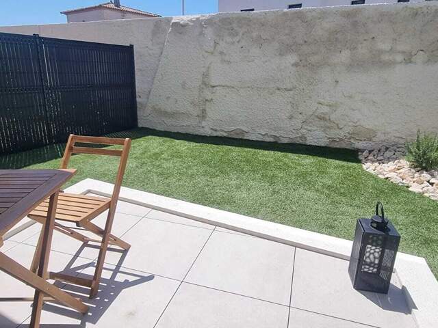 VIAS APPARTEMENT T4 92M2 HABITABLES AVEC JARDIN DE 64M2 ET TERRASSE DE 14M2 — photo du bien