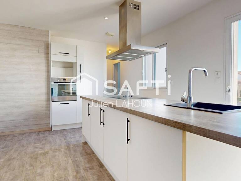 Maison plain-pied 98 m²  3 chambres  Terrain  Garage — photo 1