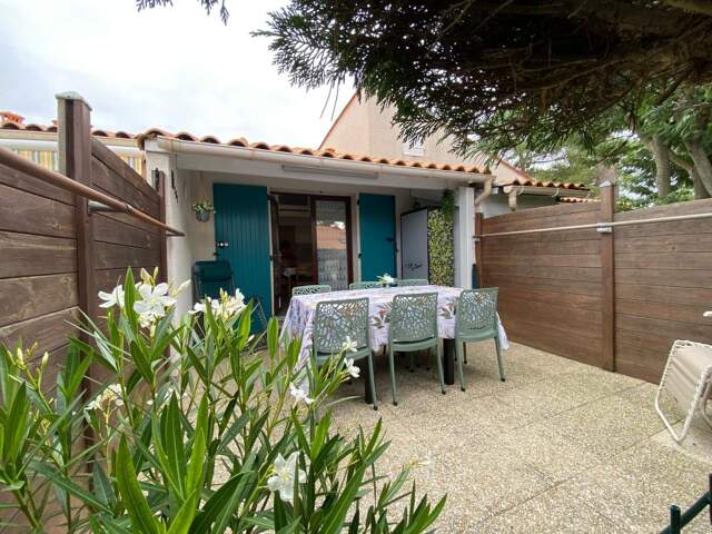 LA PALMYRE Maison 3 pièces dans Résidence Boisée avec Piscine, 400m du Centre-Ville — photo du bien