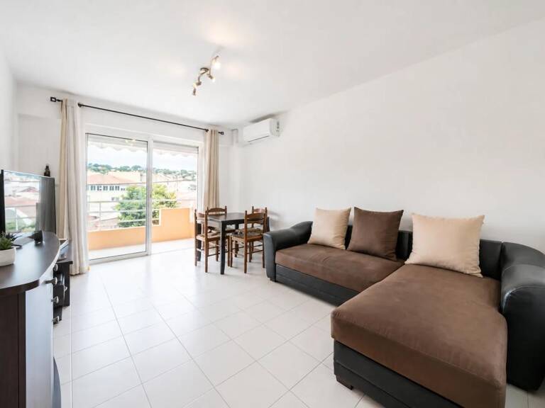 2P TRAVERSANT 44,7 M² – DOUBLE TERRASSE – STATIONNEMENT PRIVATIF — photo 1