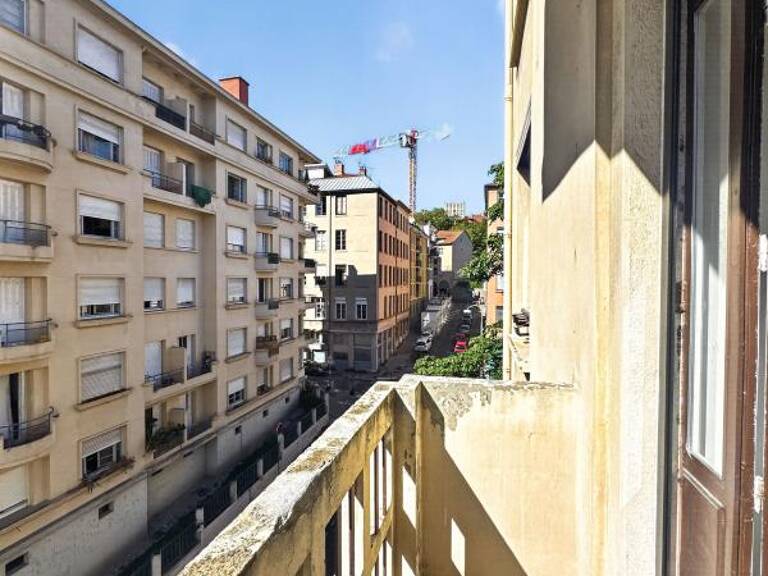 Lyon 1er, Pentes de la Croix-Rousse, 3 pièces traversant de 76,65 m² avec balcon, ascenseur et cave — photo 1