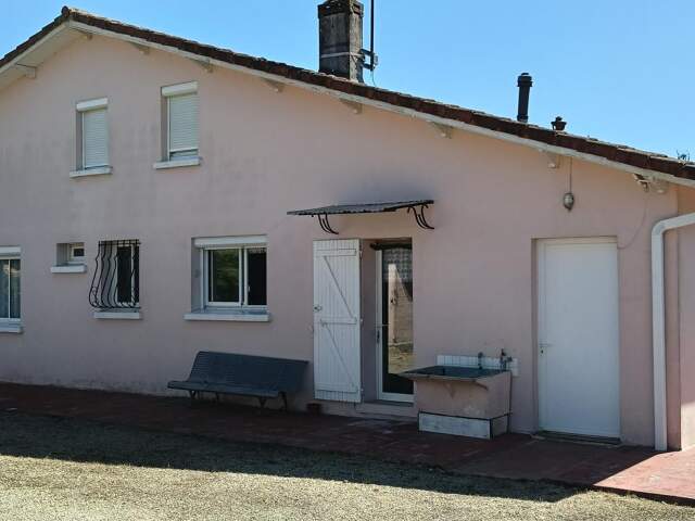 Maison 5 chambres, terrain et garage — photo du bien
