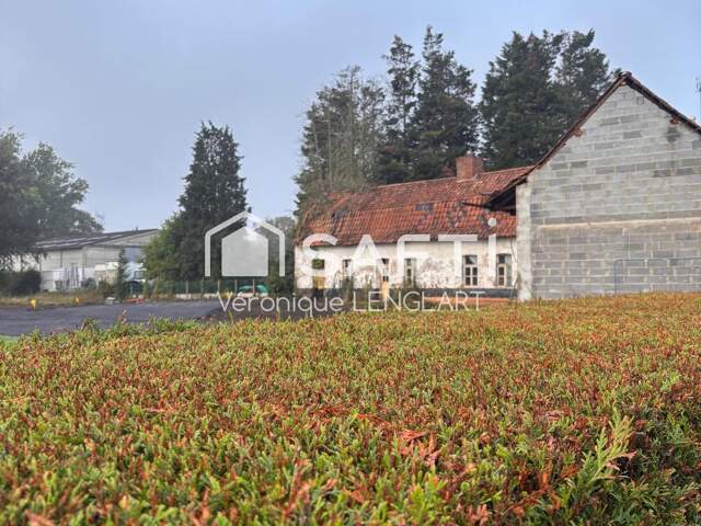 Fermette en L à rénover en centre village — photo du bien