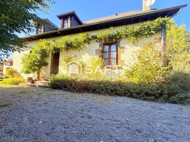 Maison de caractère dans un écrin de verdure — photo du bien