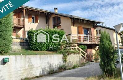 Chalet de 145m² avec garage en sousol sur 914m² de terrain — photo du bien
