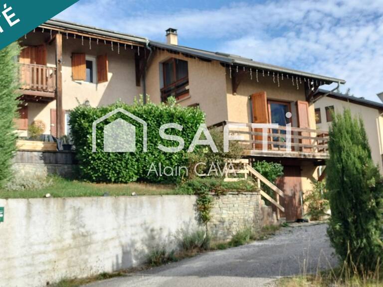 Chalet de 145m² avec garage en sousol sur 914m² de terrain — photo 1