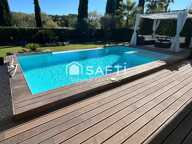 Maison contemporaine de plain-pied avec piscine à débordement  Produit exceptionnel — photo 3