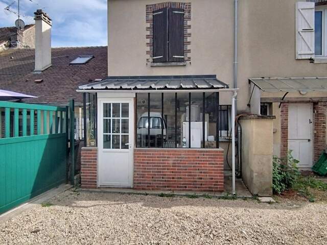 Maison sur 3 niveaux avec terrain constructible — photo du bien