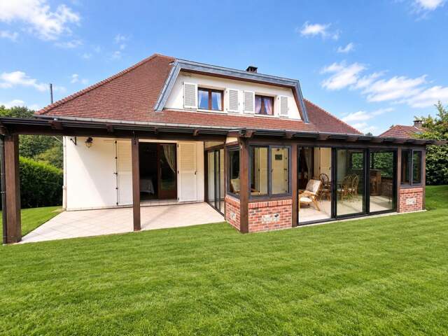 Maison familiale de 124m² avec grande véranda et sous sol complet — photo du bien