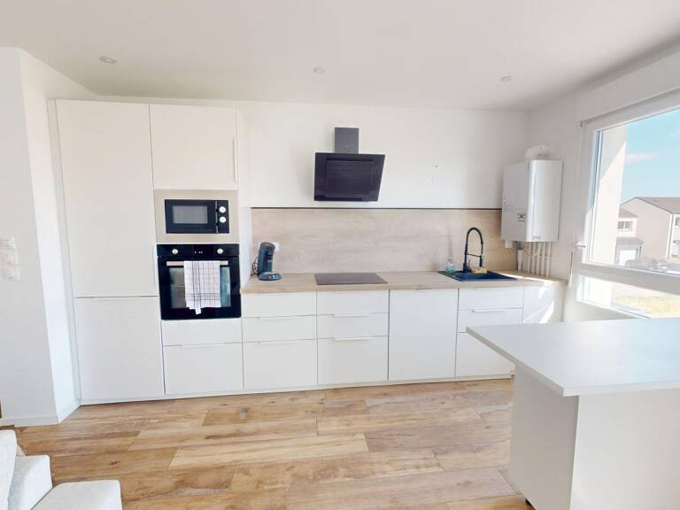 À LOUER – GUÉNANGE – F3 MEUBLÉ DE 64 M² AVEC BALCON ET STATIONNEMENTS — photo 1