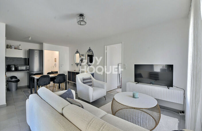 SAINT-FONS (69190) - Appartement T3 de 54 m²,  double exposition, avec balcon & garage — photo 2