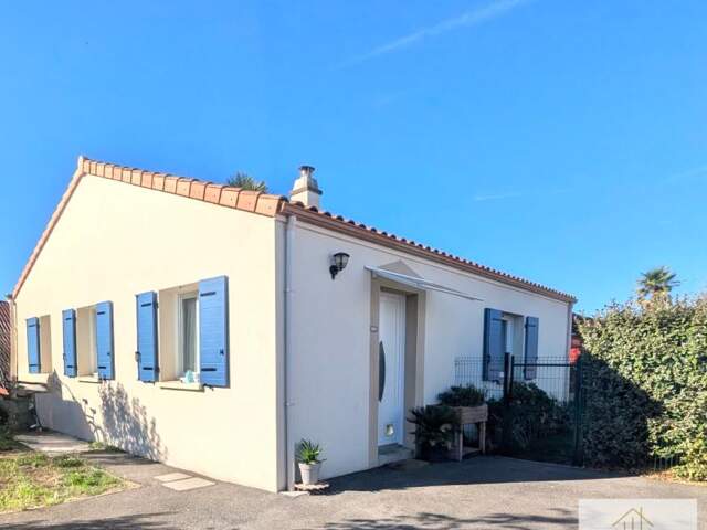 Maison de plain-pied située en impasse à moins de 10 minutes à pied du centre bourg — photo du bien