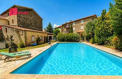 ALES en périphérie à Saint-Hilaire-de-Brethmas   Superbe Appartement P4 de caractère dans un mas du XVIII siècle, avec patio privatif, piscine et parking — photo du bien