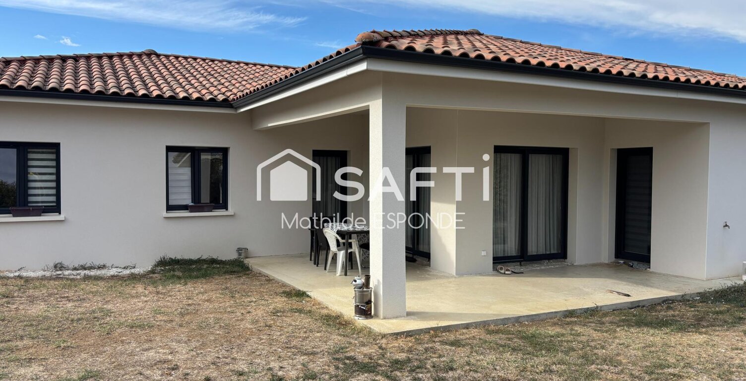 Maison de plain-pied avec garage — photo 1