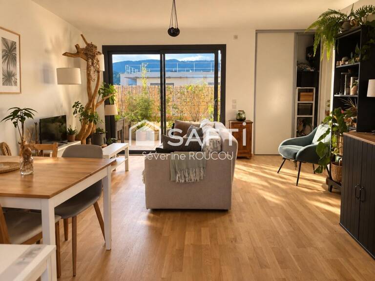 Élégant et spacieux 2 pièces de 57 m² avec deux terrasses, garage sous terrain et vues dégagées à Divonne-les-Bains — photo 1