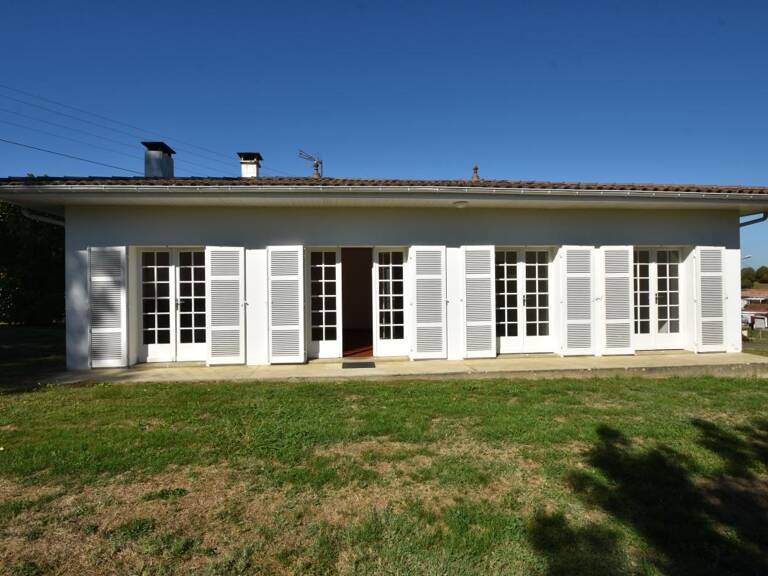 Maison de plain pied avec garage — photo 1