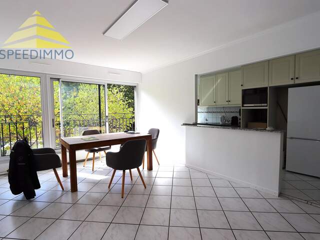 Appartement 4 pièces avec balcon, parkings et cave — photo du bien