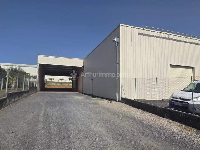 PUYGOUZON - Grand local dans zone commerciale — photo du bien