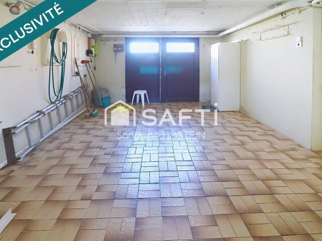 Maison jumelée avec 3 chambres, jardin et garage! — photo du bien