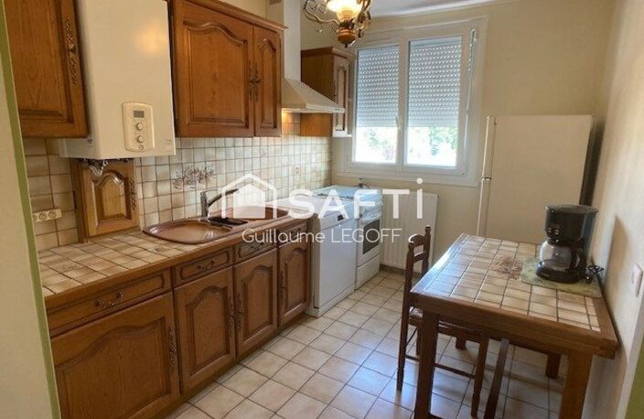 **T3/T4 lumineux avec balcon et vue dégagée** — photo 3