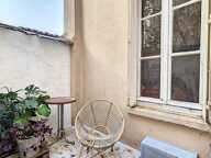 APPARTEMENT ATYPIQUE AVEC COURETTE PRIVATIVE — photo 4