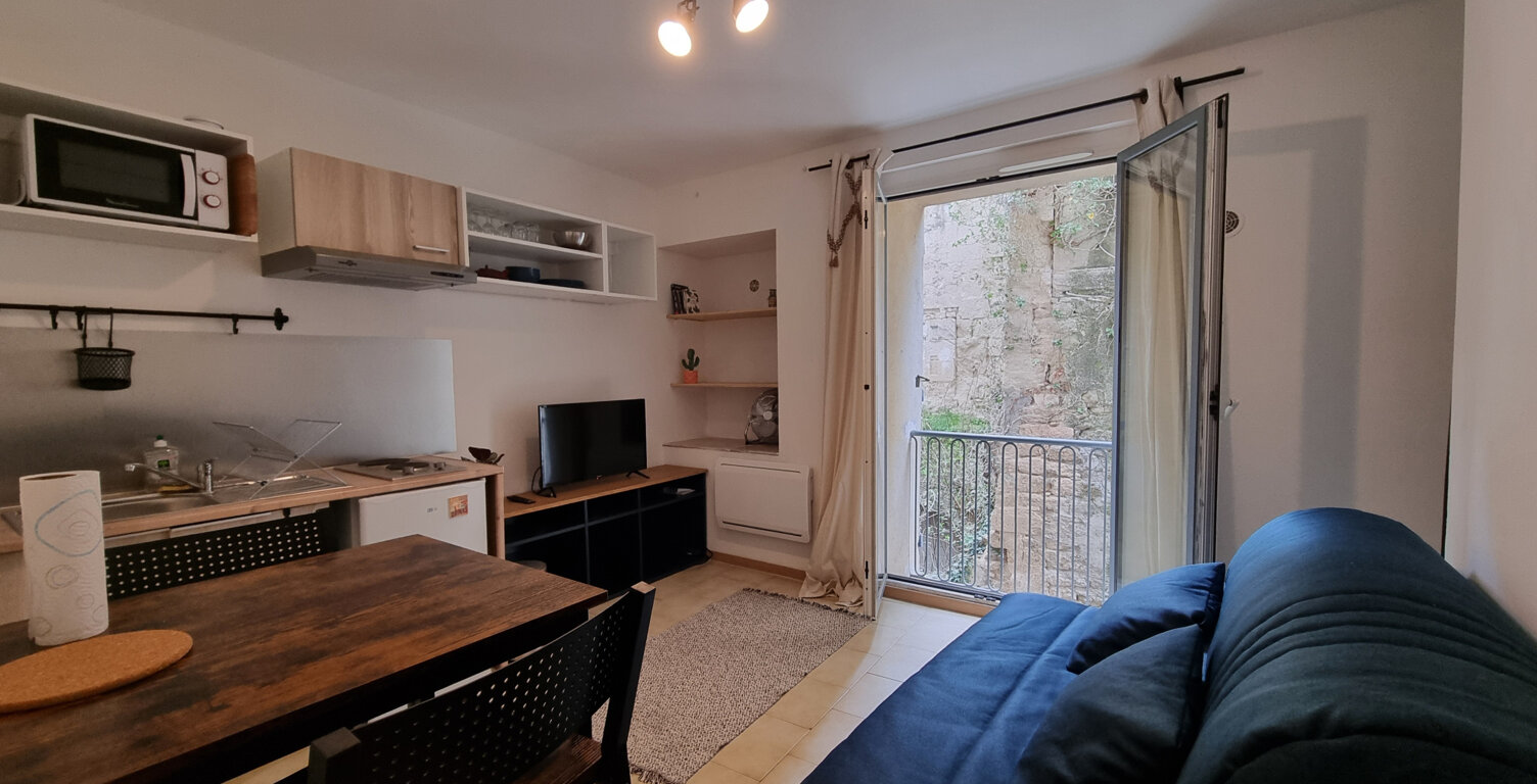 VENTE IMMEUBLE SOMMIERES - 3 LOGEMENTS ET UNE CAVE — photo 1