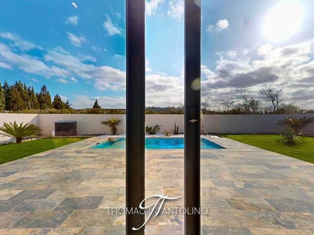 EN EXCLUSIVITE - PLAIN PIED - 4 CHAMBRES - PISCINE - GARAGE — photo du bien