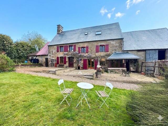 Maison en pierre de 244 m2 habitables avec chambres d'hôtes et 8500 m2 terrain à vendre CHAMP DU BOULT (14) — photo du bien