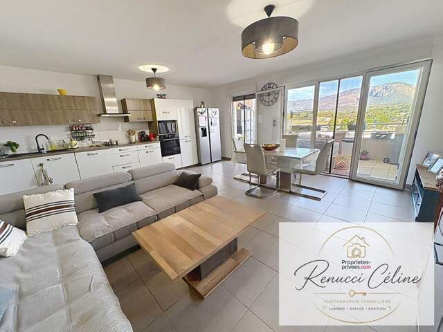 T4  de 80 m² avec terrasse et vue dégagée à  Sarrola-Carcopino — photo du bien