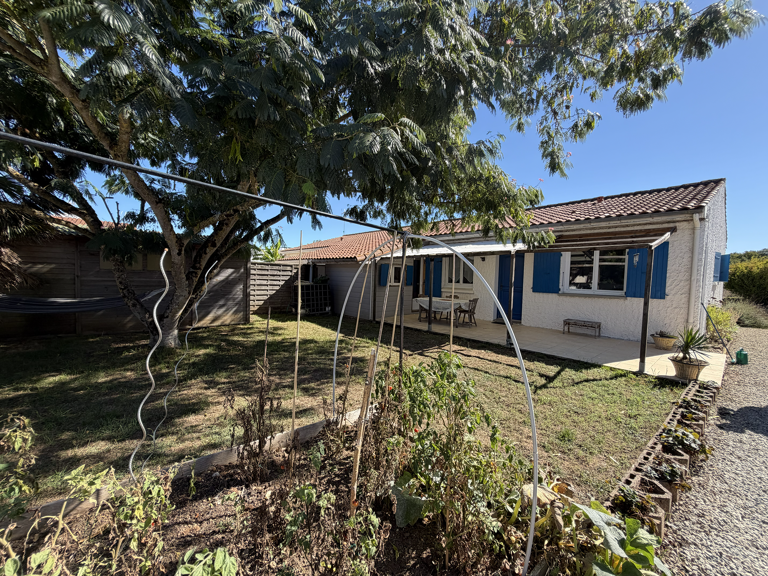 Exclusivité : Maison de plain-pied 3 chambres avec jardin et — photo 1