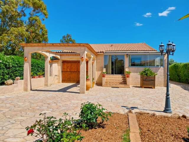 Vente maison fonctionnelle à Marseillan avec grand jardin et garage — photo du bien