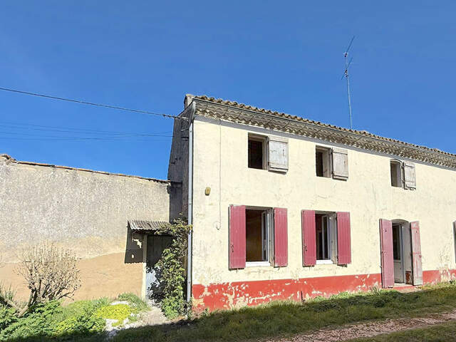 A VENDRE MAISON EN PIERRE AVEC JARDIN ET GARAGE - SECTEUR BLAYE - CARTELEGUES — photo du bien