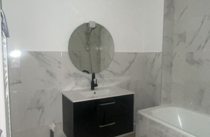 CENTRE LIVRON - Appartement T4 rénové — photo 4