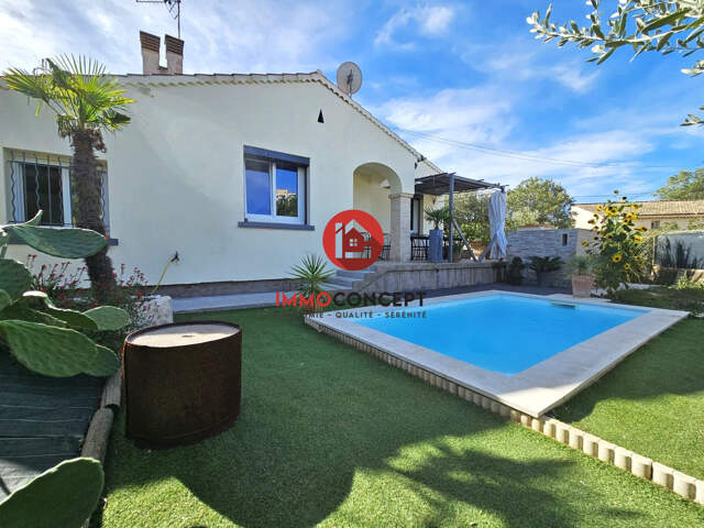 Maison plain-pied avec piscine et joli jardin — photo du bien