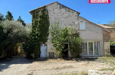 Ensemble immobilier avec appartement rénové - TRAVAILLAN - 220m² — photo du bien