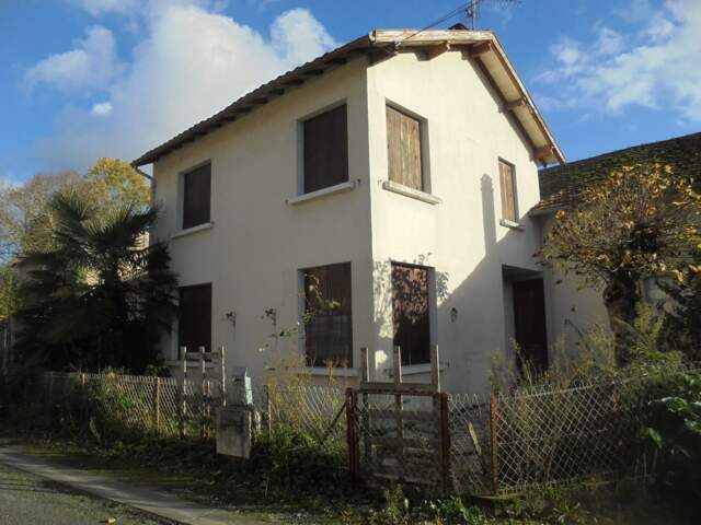 Maison à rénover avec grand garage — photo du bien