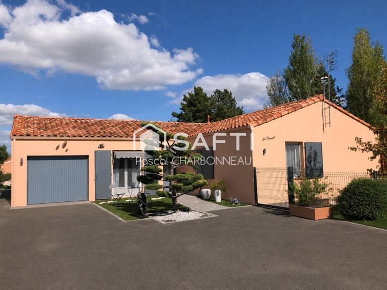 PLAIN PIED 3 CHAMBRES GARAGE CARRELE ASSAINNISSEMENT COLLECTIF — photo 1