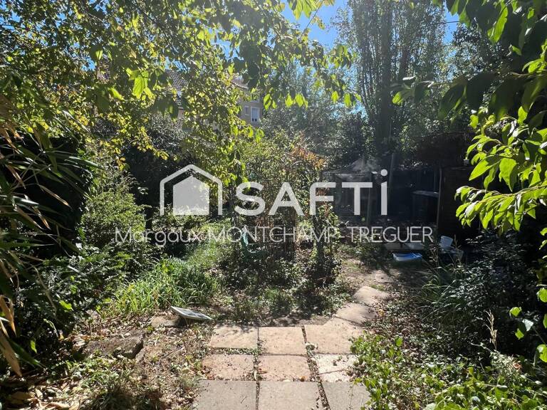 Rez-de-jardin de 85m², grand jardin, garage double — photo 1