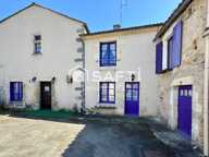Maison de caractère de 220 m² au cœur de la cité médiévale de Saint-Loup-Lamairé avec studio indépendant, garage et dépendances. — photo 3
