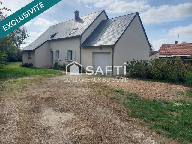Pavillon familial 4 chambres avec garage et terrain — photo du bien