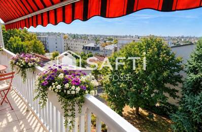 Proche commerces et gare, Appartement T3 de 63,02 m2 avec balcon filant,  cave et place de parking intérieure — photo du bien