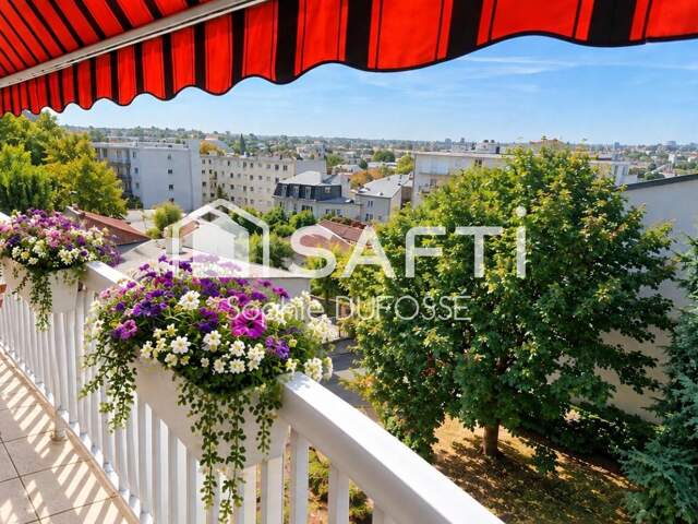 Proche commerces et gare, Appartement T3 de 63,02 m2 avec balcon filant,  cave et place de parking intérieure — photo du bien