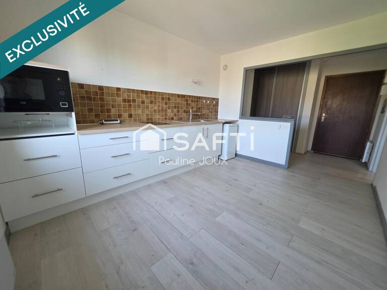 Appartement type F2 avec balcon, garage, cave et grenier — photo 1