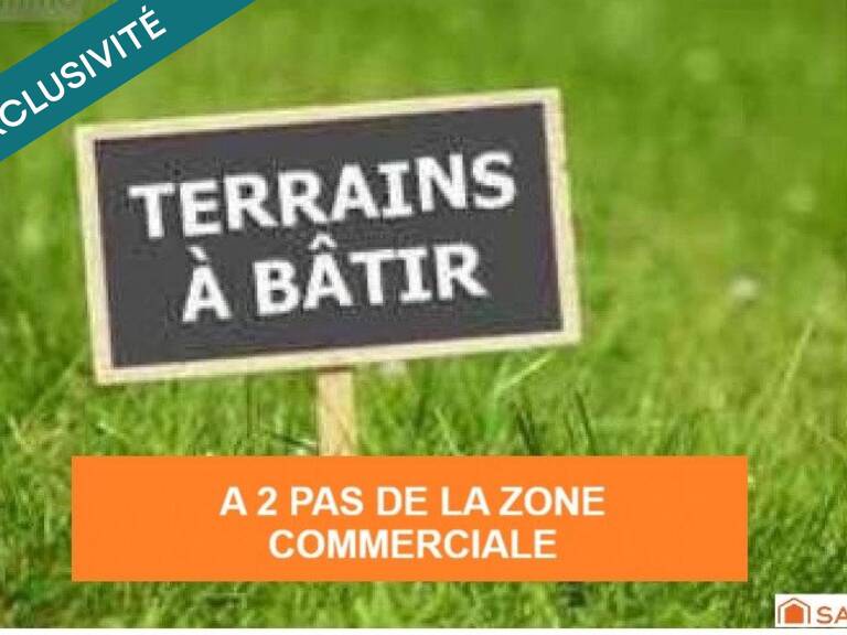 TERRAIN A CONSTRUIRE VIABILISE ZONE COMMERCIALE — photo 1