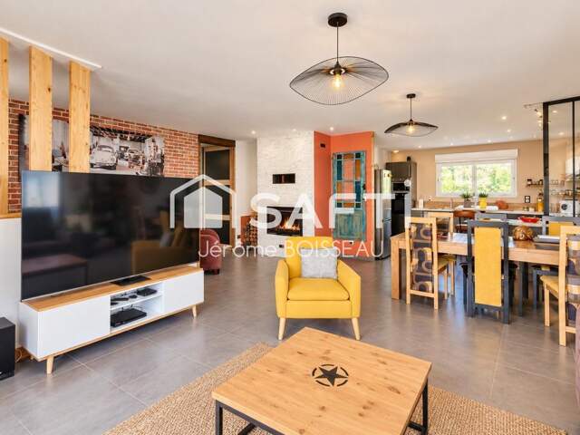 Maison familiale de plain-pied  130 m²  4 chambres  Terrain 705 m²  Garage indépendant — photo du bien