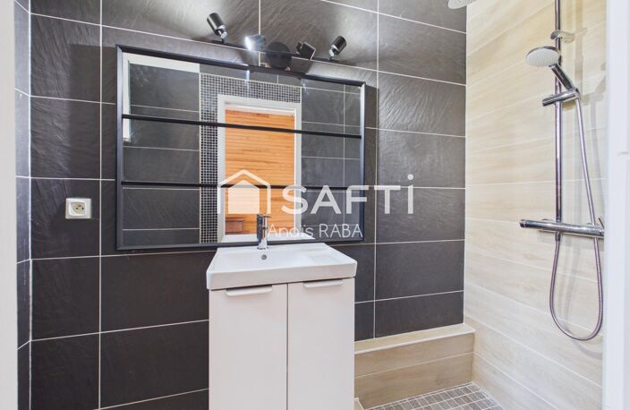T2 AU CALME PROCHE DES COMMODITES — photo 3