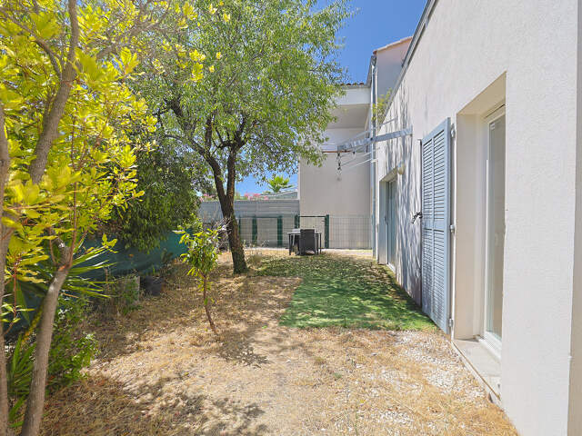 T3 en rez-de-jardin avec grand jardin privatif, garage et parking   Résidence haut de gamme de 2019 — photo du bien