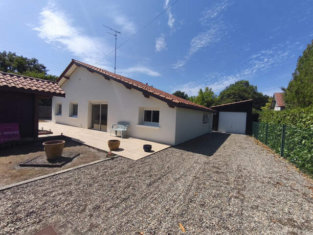 BISCARROSSE CENTRE-VILLE   Maison de plain-pied avec jardin, proche commerces et plages océanes — photo du bien