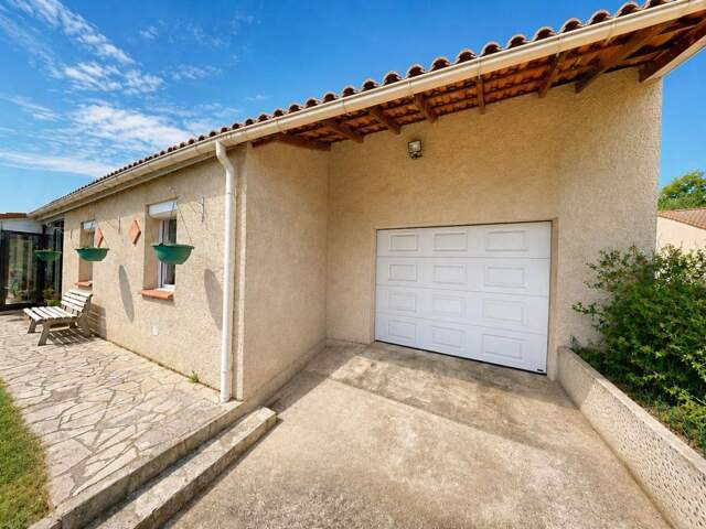 SAINT-ALBAN – MAISON INDIVIDUELLE DE PLAIN-PIED – 3 CHAMBRES – GARAGE AVEC ROCHELLE – VERANDA - PARCELLE DE 617 M² — photo du bien